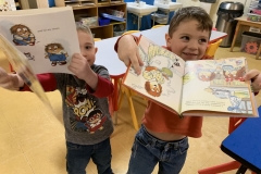 Choosing free books to take home brings smiles!